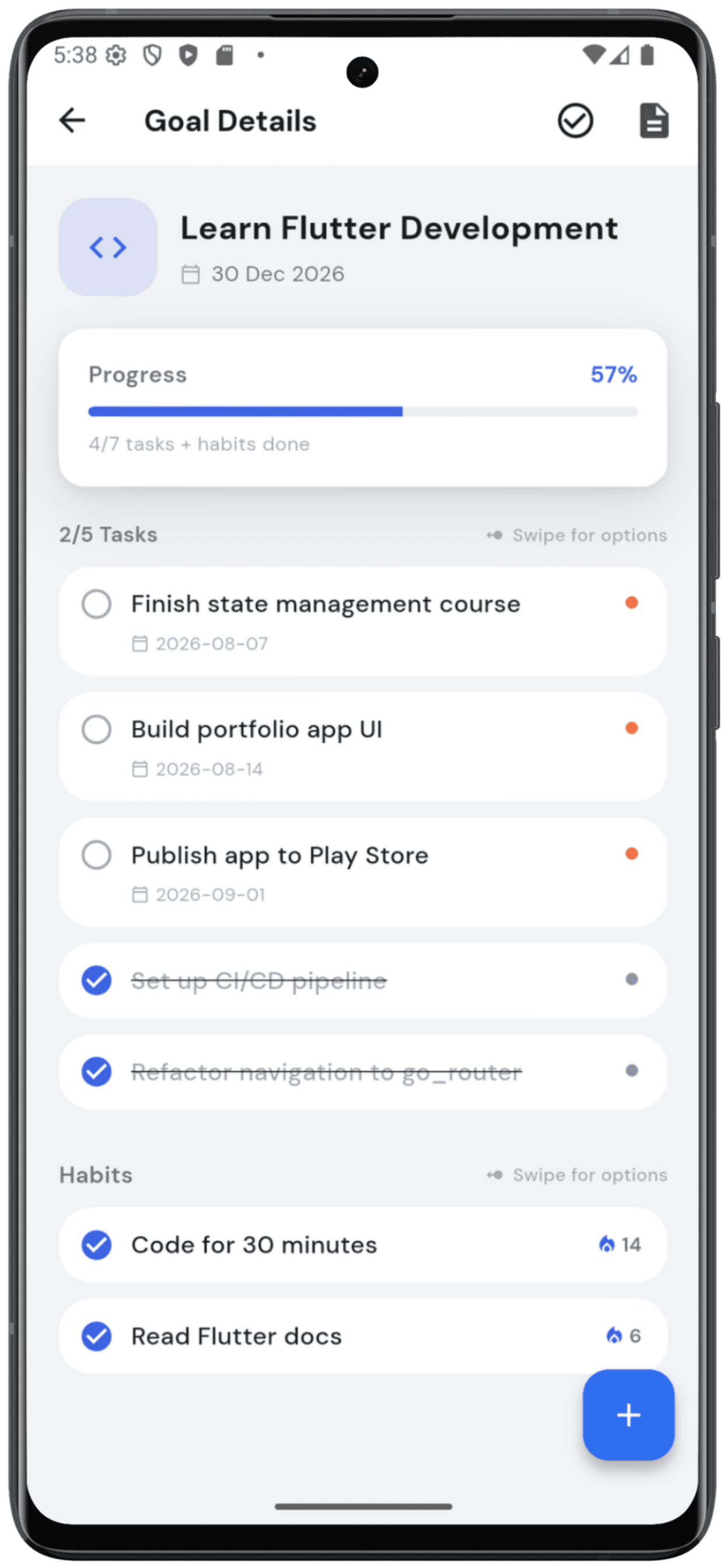 A goal detail screen showing nested tasks and habits